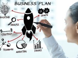 Woman creating a business plan and describing what to do after