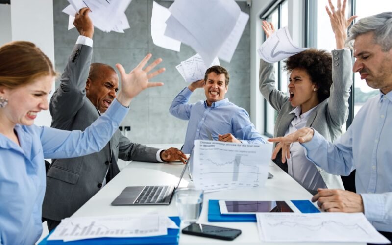 A group of business leaders planning a communication strategy during a crisis