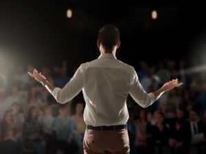 Big room with audience for a man practising his public speaking