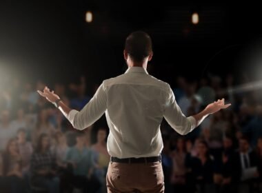 Big room with audience for a man practising his public speaking