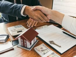 Landlord rental property registration form with the keys on a table