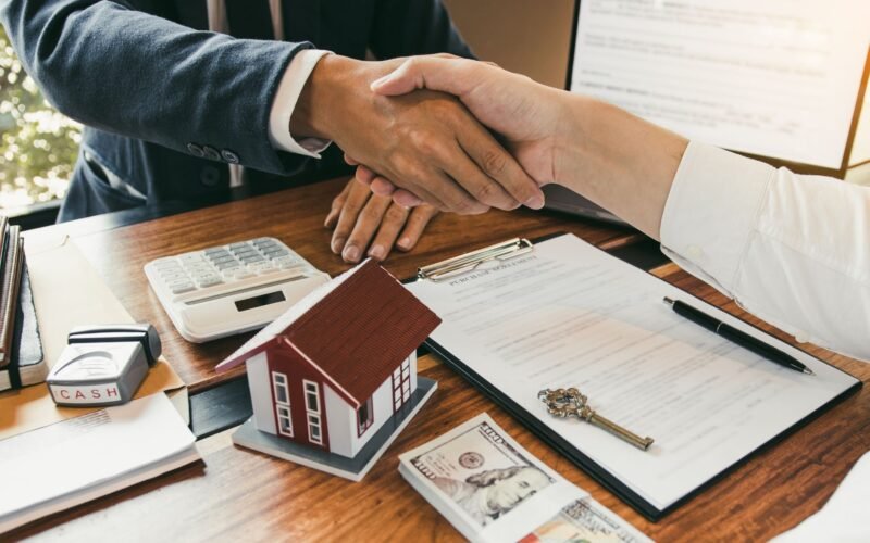 Landlord rental property registration form with the keys on a table